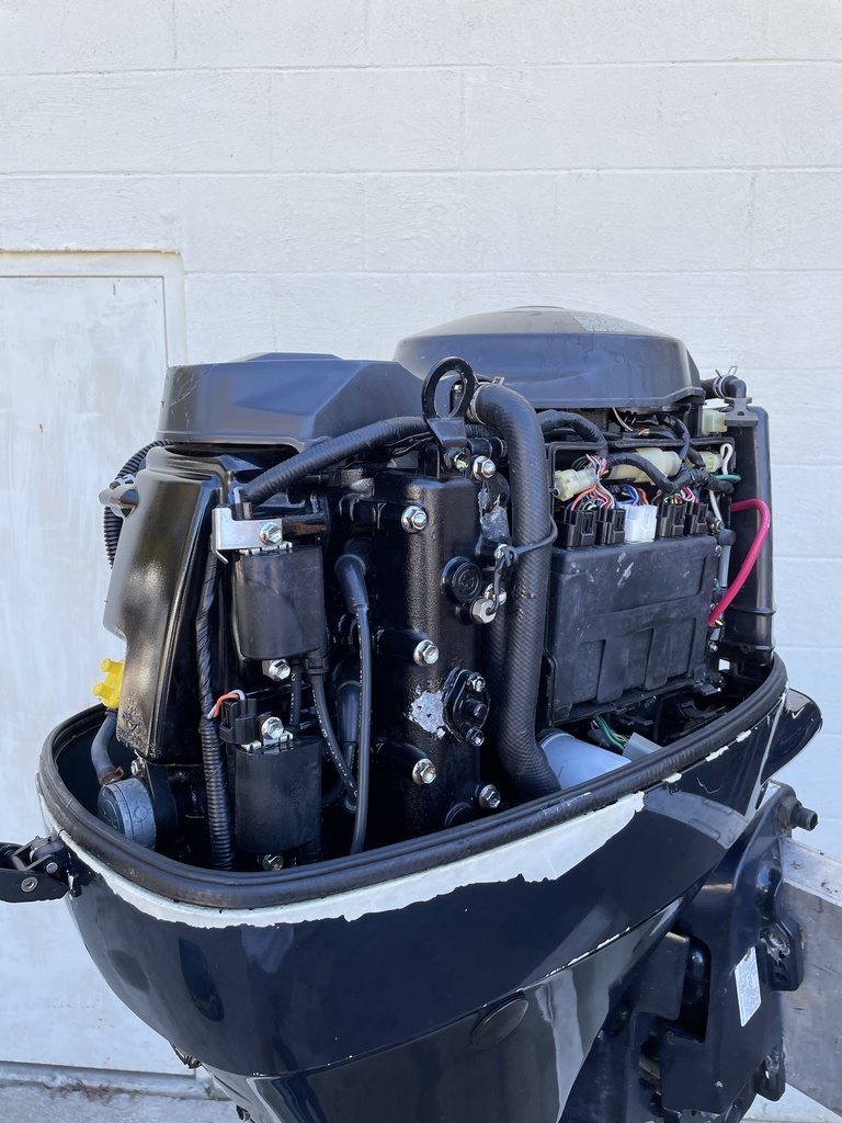 2000 Johnson / Suzuki 70HP 4 Stroke Outboard With 20" Shaft 171 Hours
